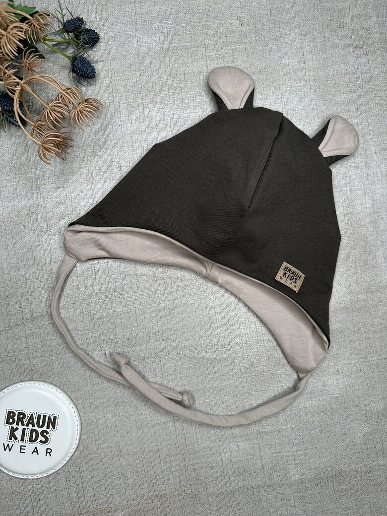 Starpsezonas sienamā cepure ar austiņām - tumša haki ar bēšu (46- 48izm)